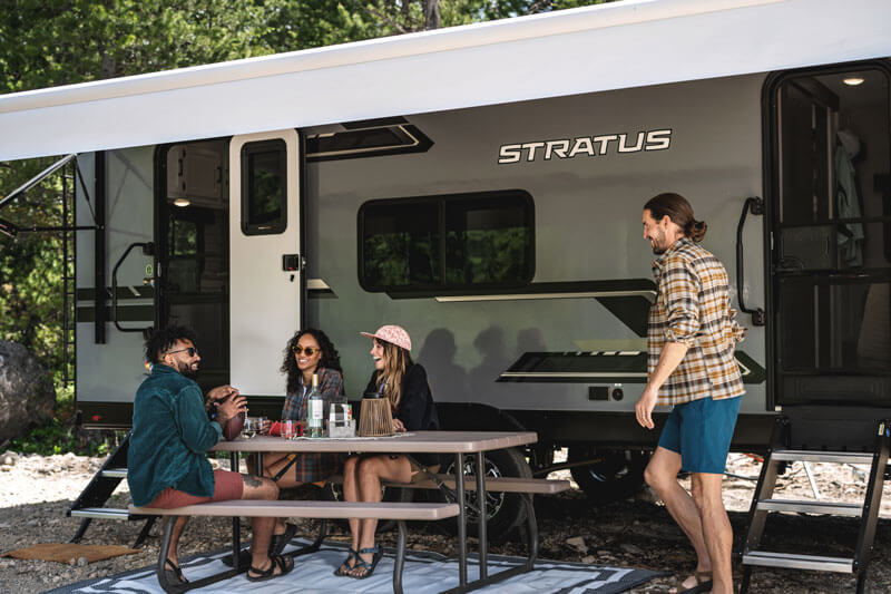 Venture RV Stratus Travel Trailer at Campsite by Picnic Table